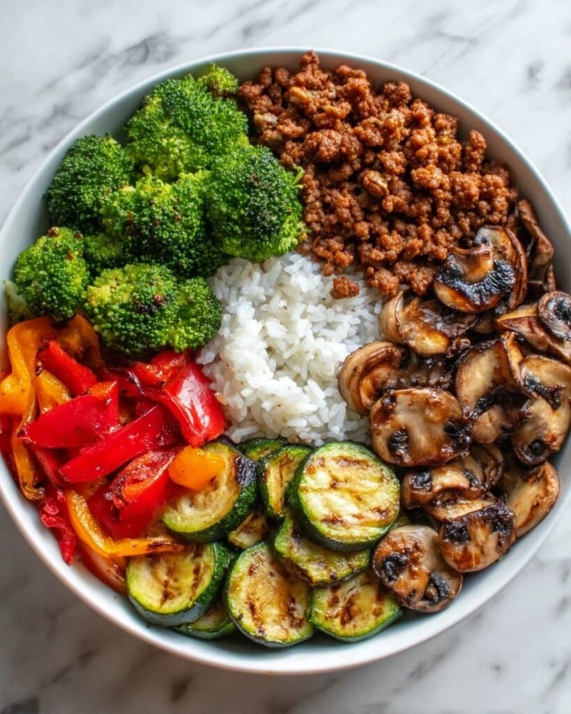 Spicy Ground Beef Stir-Fry Bowl with Garlic Veggies & Steamy Rice Recipe