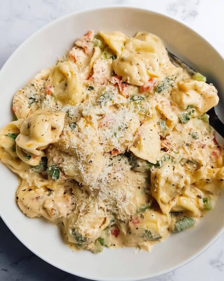 Creamy Vegetarian Tortellini with Spinach, Tomato, and Mozzarella Recipe