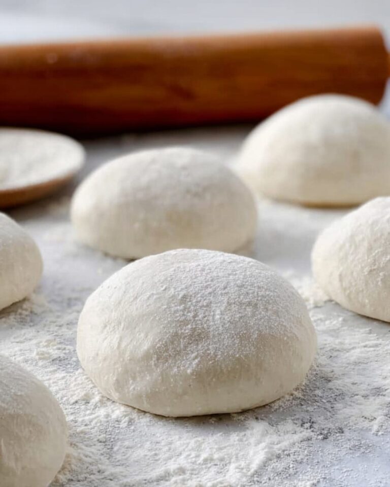 Rustic Italian Pizza Dough with Heirloom Tomatoes, Caramelized Onions, and Fresh Basil Recipe