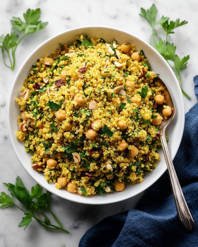 Simple Curry Spiced Quinoa with Chickpeas, Herbs, and Raisins Recipe